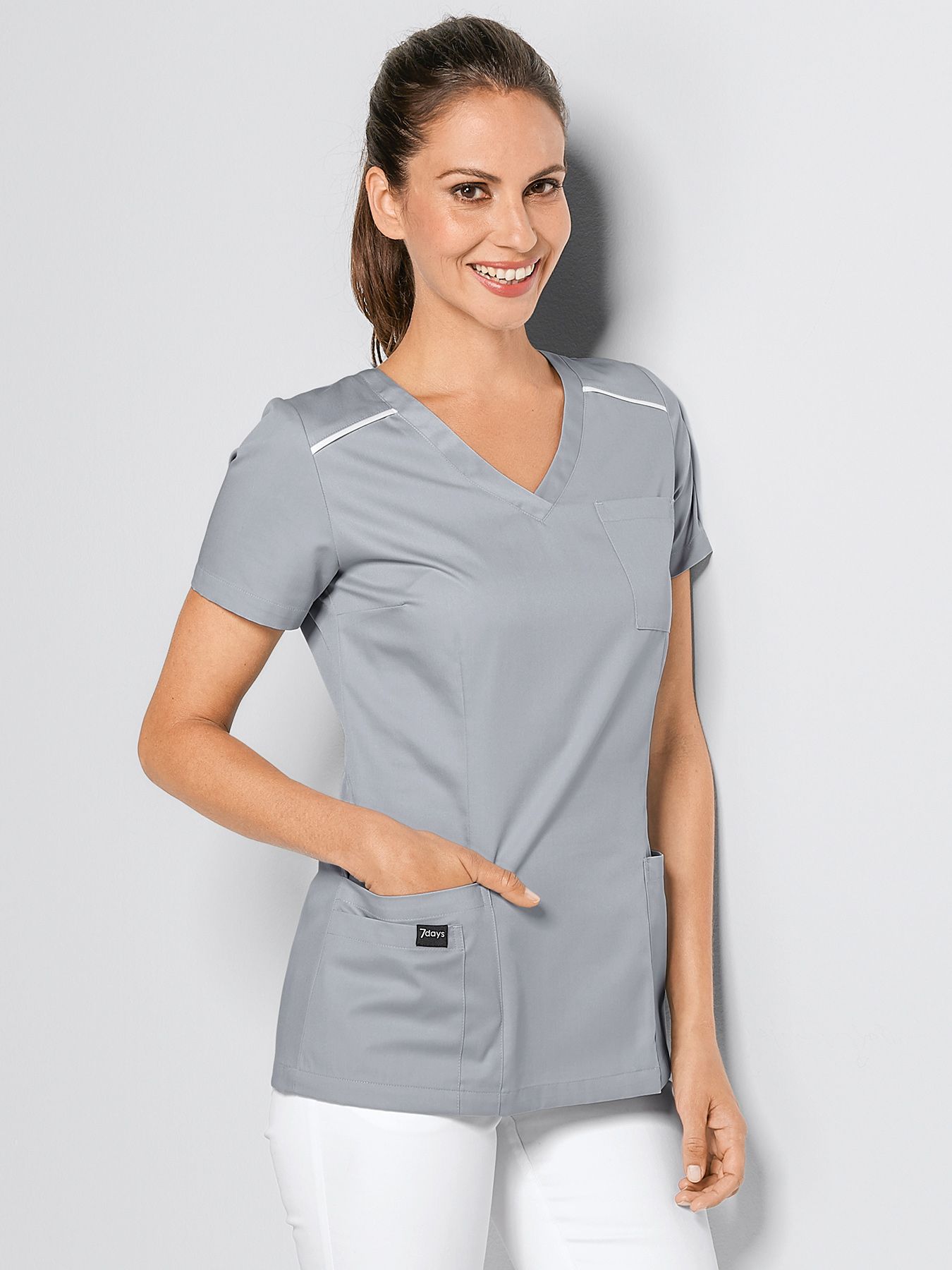 Tunika med dekorativ søm